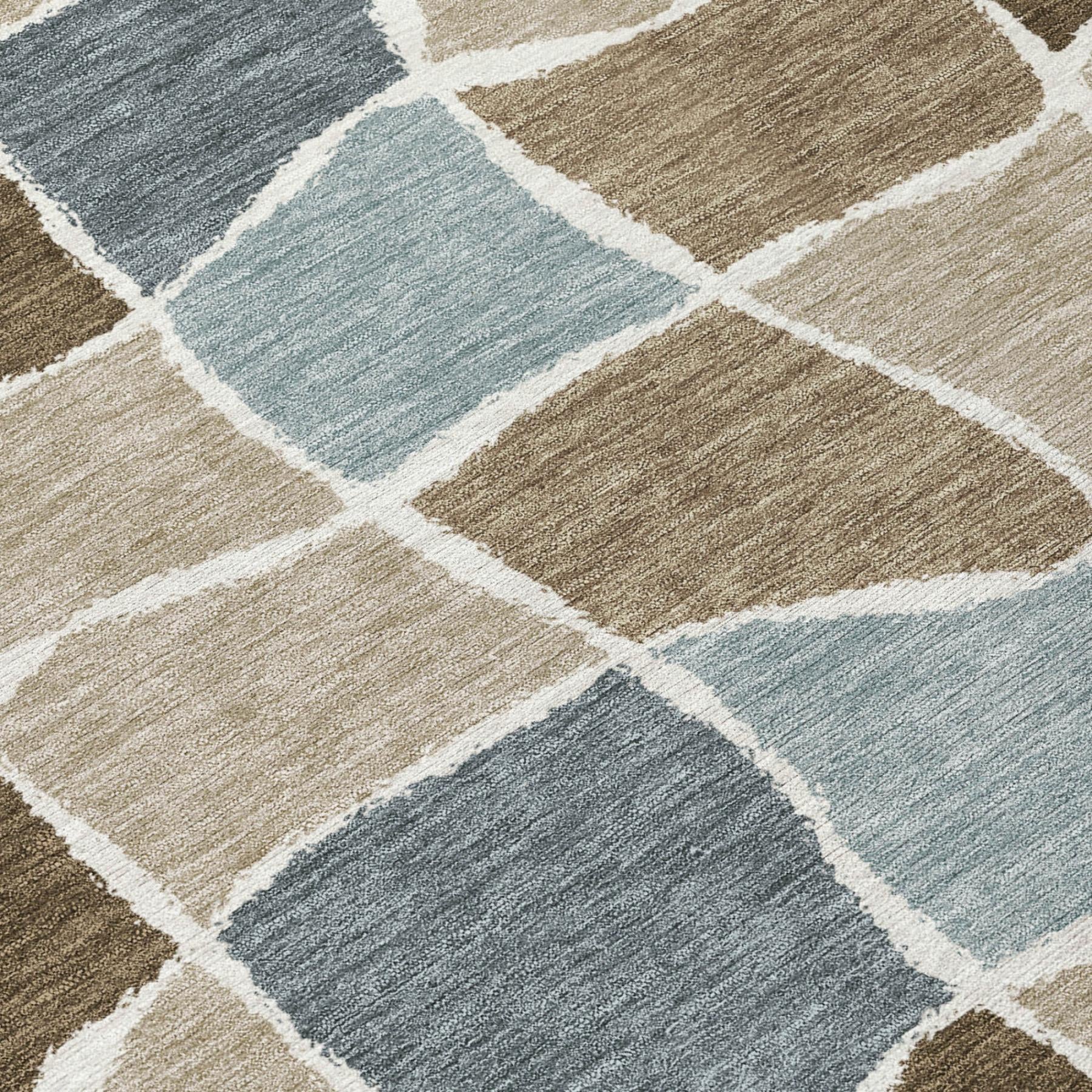 Geometric area rug close-up with beige, brown, and light blue blocks separated by white lines