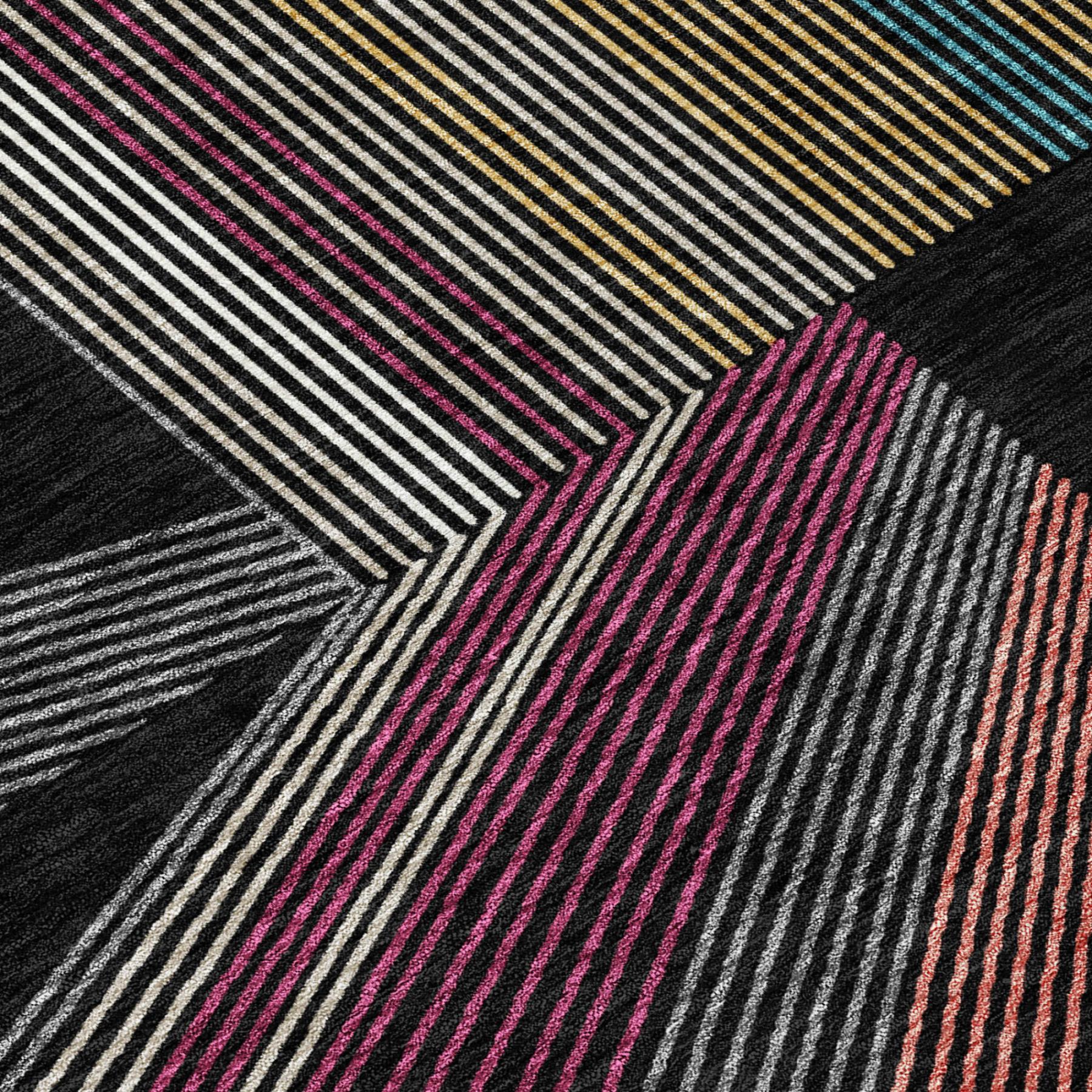 Black geometric area rug with multicolor striped pattern and modern block accents
