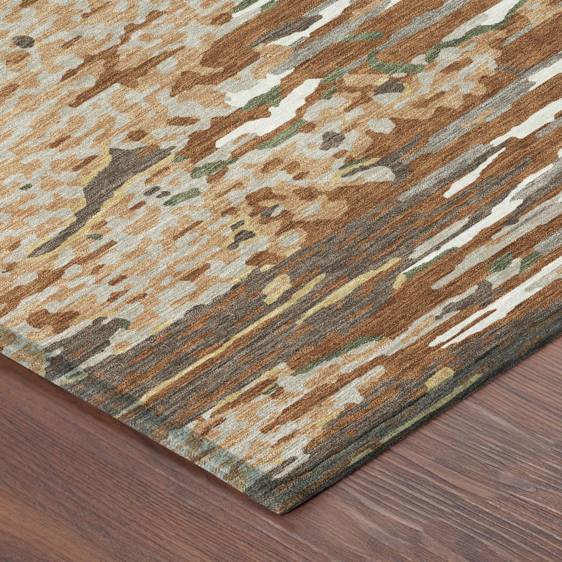 Corner of abstract area rug with multicolor distressed pattern and bound edge