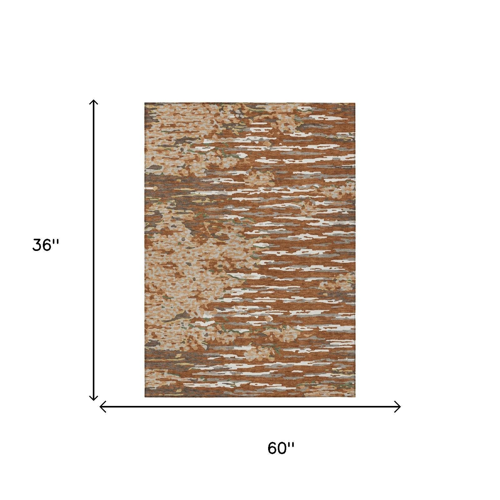 Abstract area rug, orange and beige, rectangular 60 in by 36 in