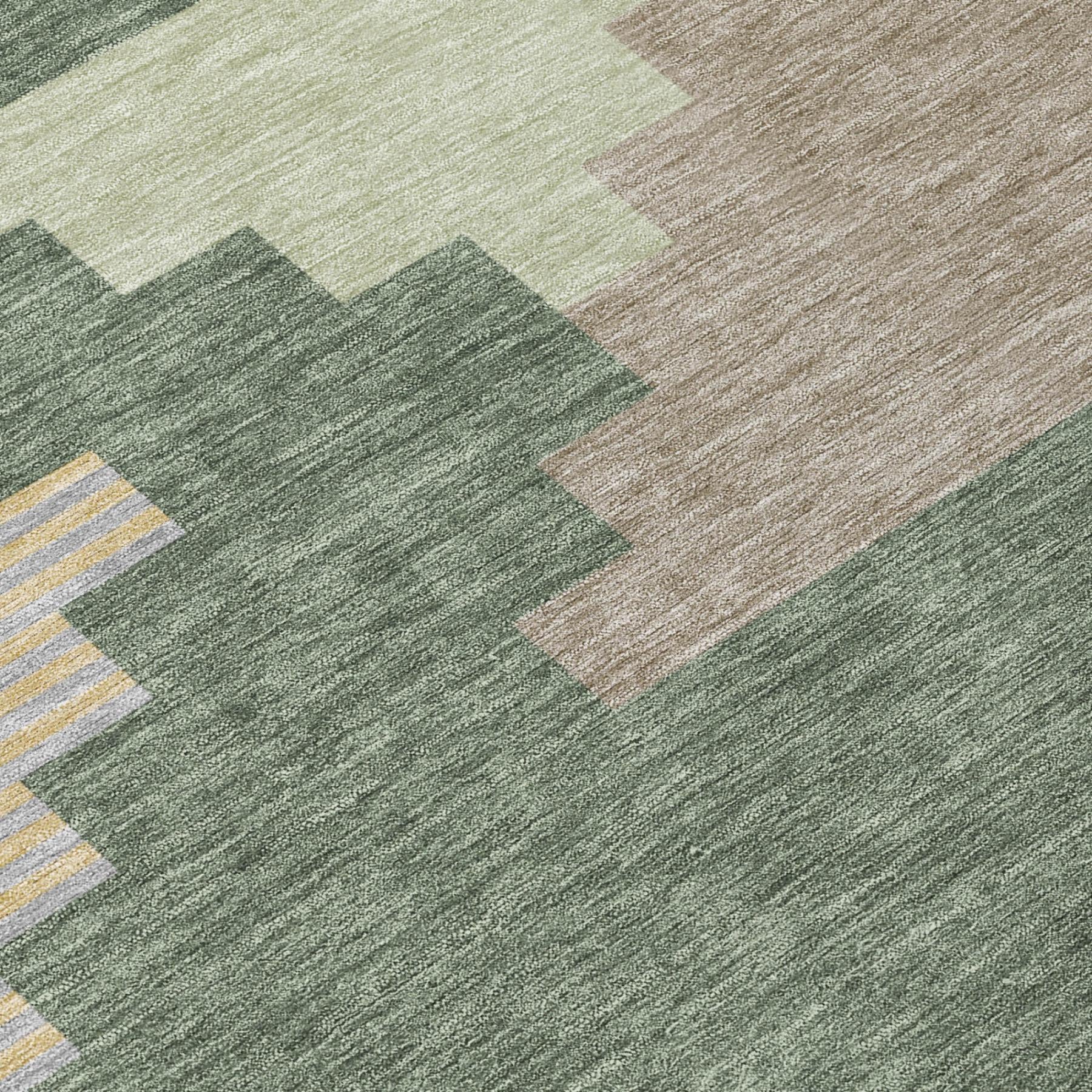 Green geometric area rug with gray and beige block pattern, low pile.
