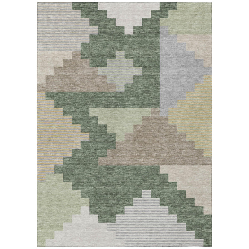 Patchwork geometric area rug with green, gray, beige, and white square shapes.