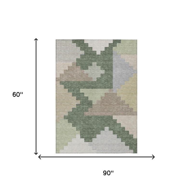 Geometric area rug with green and gray blocks on beige background, 90x60 in.