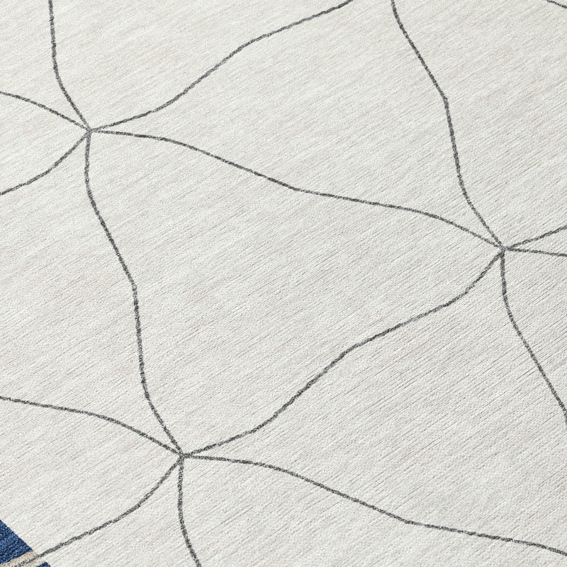 Round rug close-up: light fabric with thin dark gray geometric lines