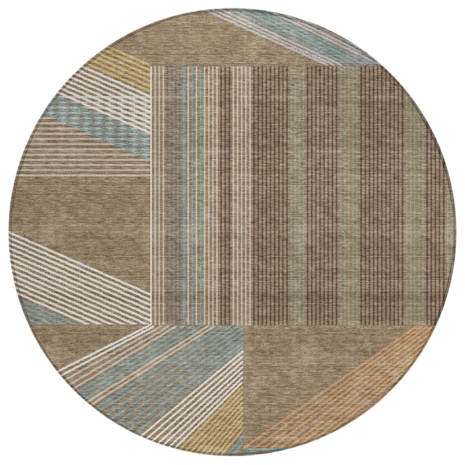 Round geometric area rug with brown, gray, and light blue patchwork blocks
