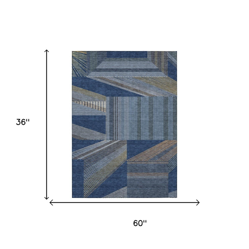 Blue geometric area rug, 60 x 36 in, navy and golden stripe patchwork design