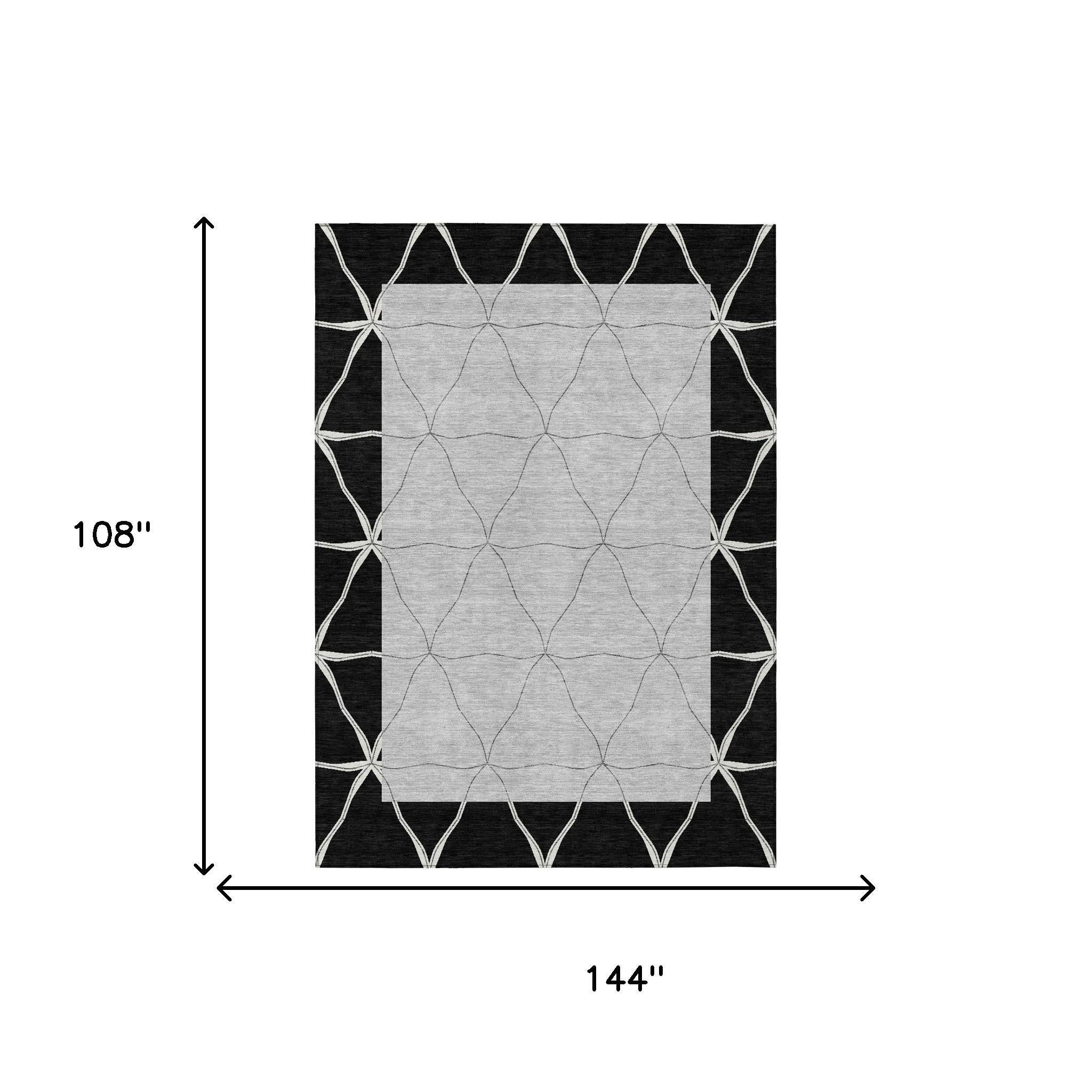 108x144 black and silver geometric rug with gray center and white lattice border