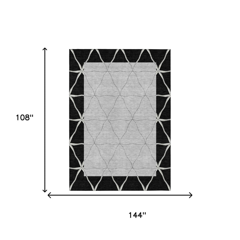 108x144 black and silver geometric rug with gray center and white lattice border