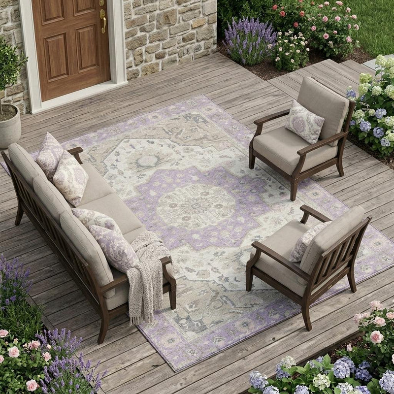 Lavender and cream oriental medallion area rug on a wooden patio floor