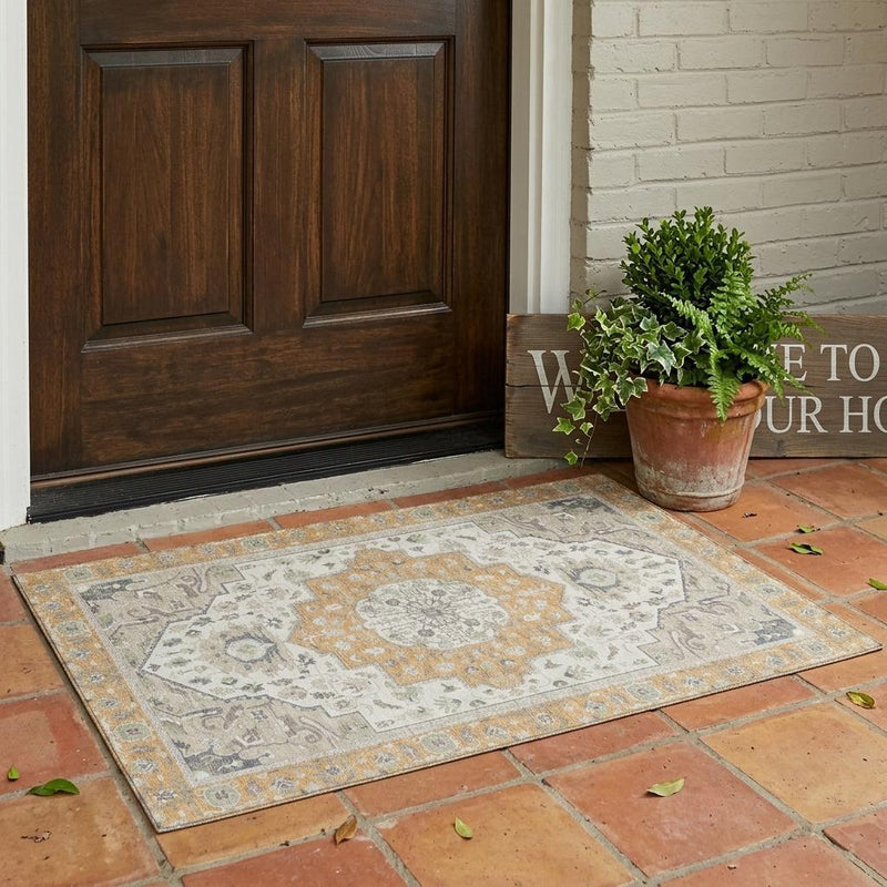 Oriental area rug with cream field, peach-gold center medallion, and gray accent motifs