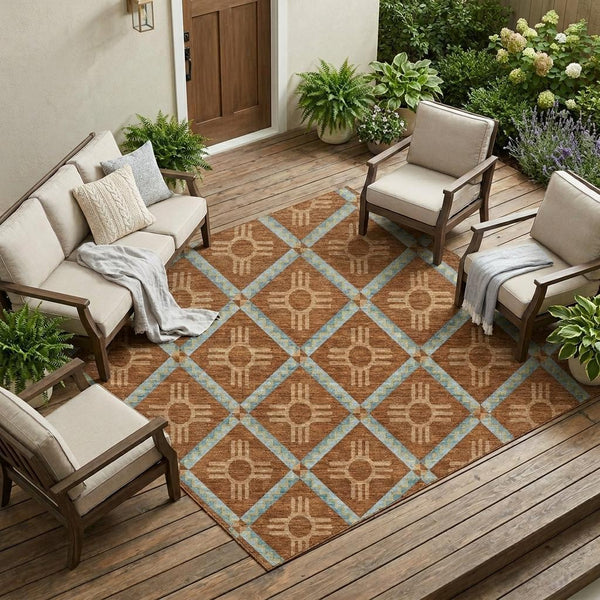 Geometric area rug with orange-brown diamond pattern and light blue border lattice