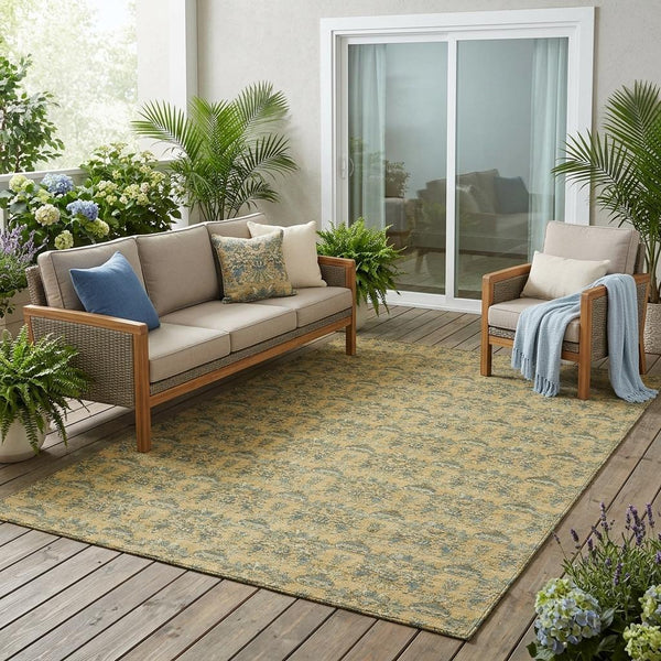 Gold and teal floral medallion area rug with textured pattern for indoor outdoor use