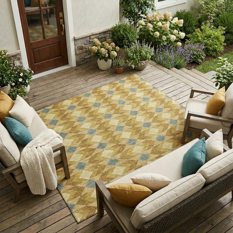 Geometric outdoor area rug with brown and cream diamonds and muted blue highlights