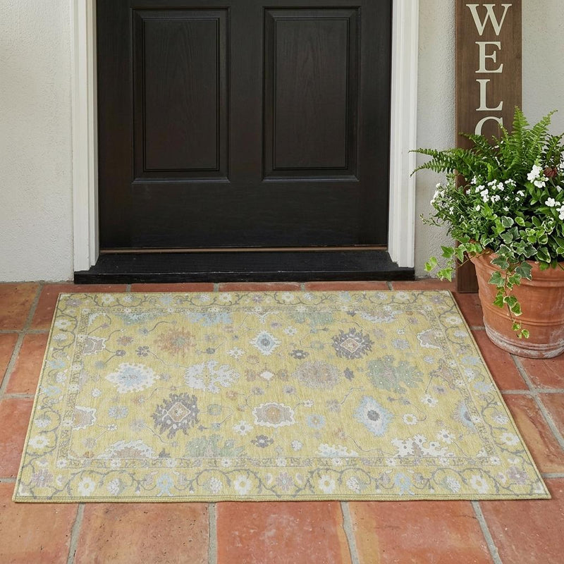 Wheat and ivory oriental area rug on floor, light blue pattern with trimmed border