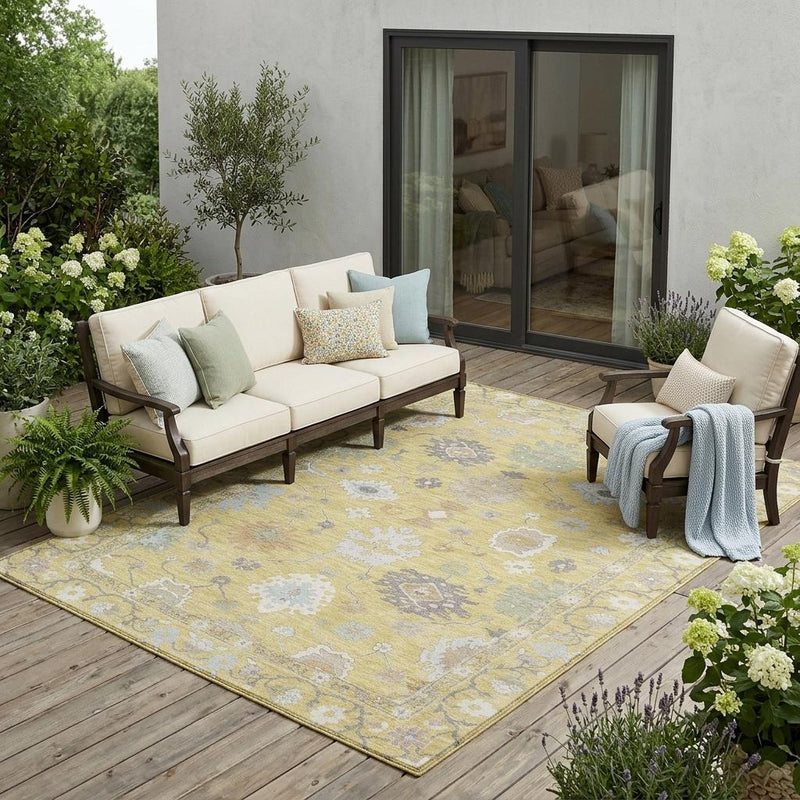 Wheat yellow outdoor area rug with ivory and blue-gray floral pattern