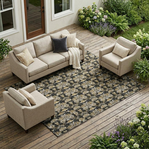 Rectangular black area rug with ornate wheat, cream, and gray floral medallion pattern