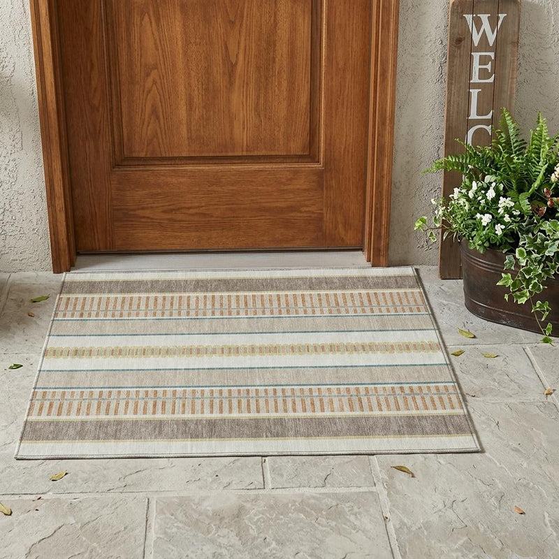 Ivory and teal striped washable area rug placed at entryway with flat border