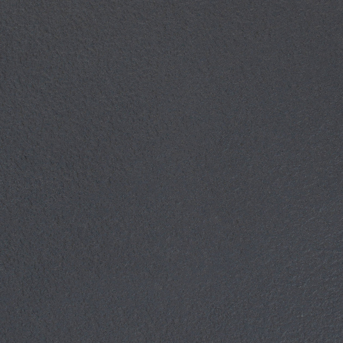 Black faux marble tabletop texture with subtle speckling