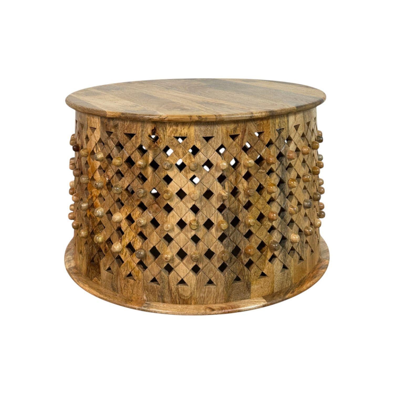 Natural solid wood round drum coffee table angled view with diamond lattice pattern