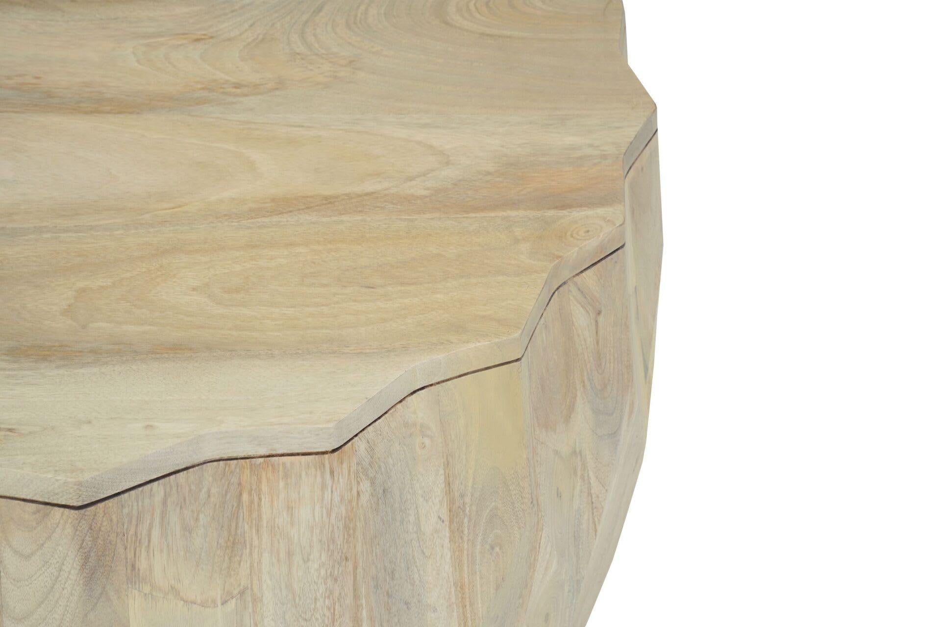 Natural wood drum coffee table corner detail with beveled top edge