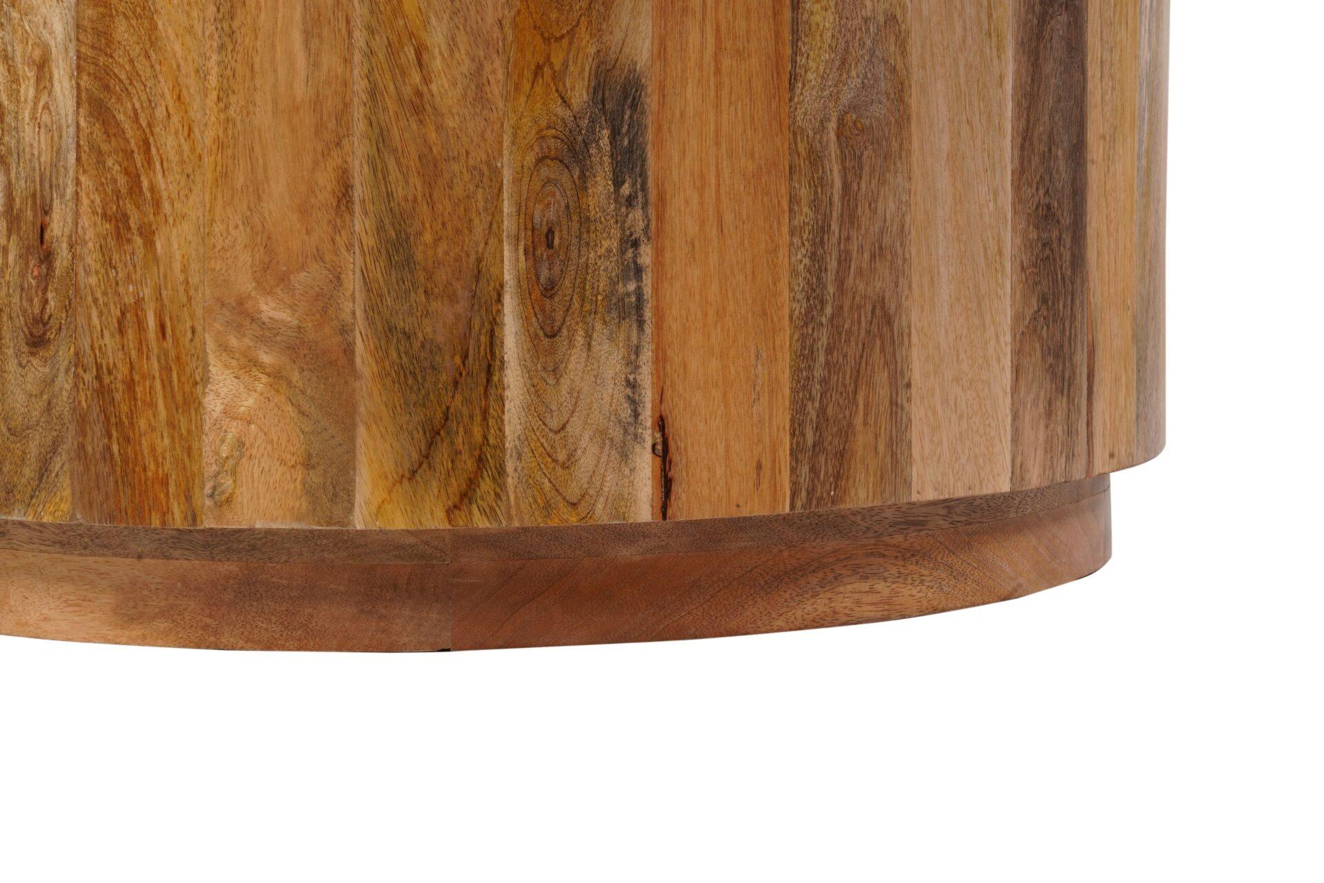 Round wood coffee table edge close-up, natural grain finish and curved apron