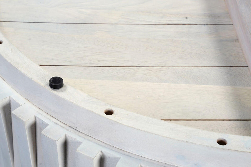 White round wood coffee table base with vertical slats and visible screws