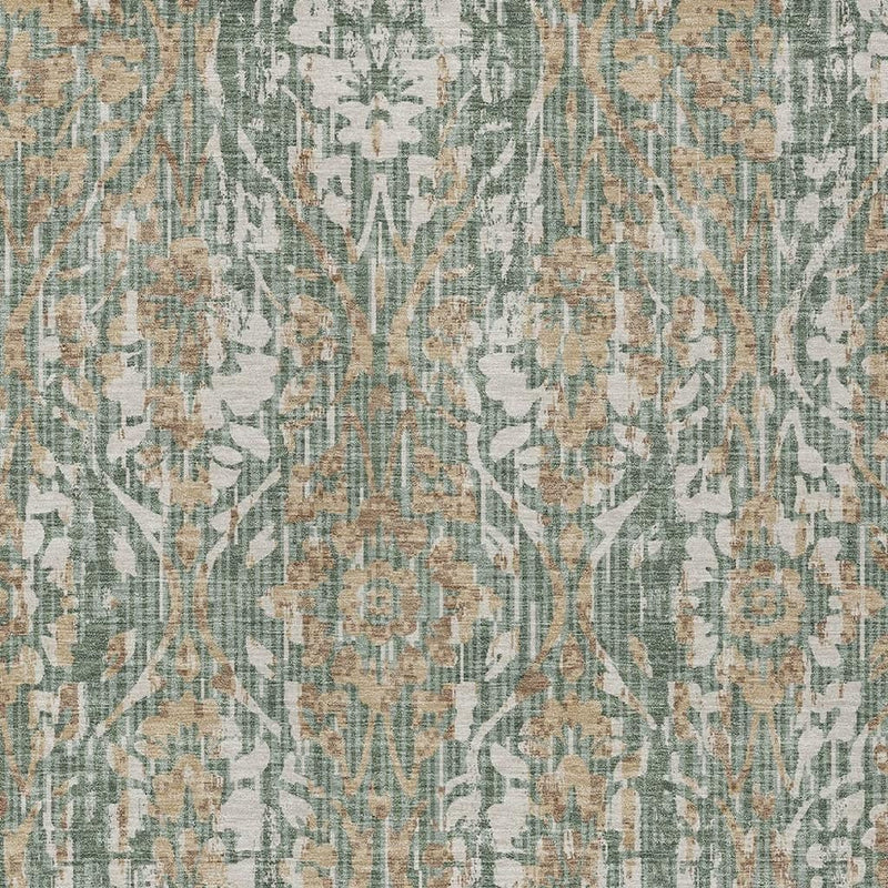 Detail view of green and sage damask rug pattern with beige accents and subtle distressing.