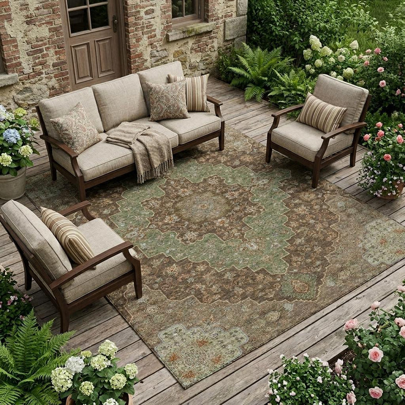 Chocolate and olive medallion area rug on an outdoor wooden patio deck