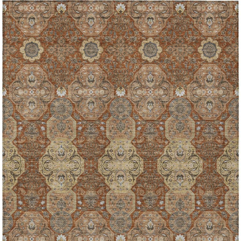 Orange and copper floral area rug, symmetrical medallion pattern with beige accents