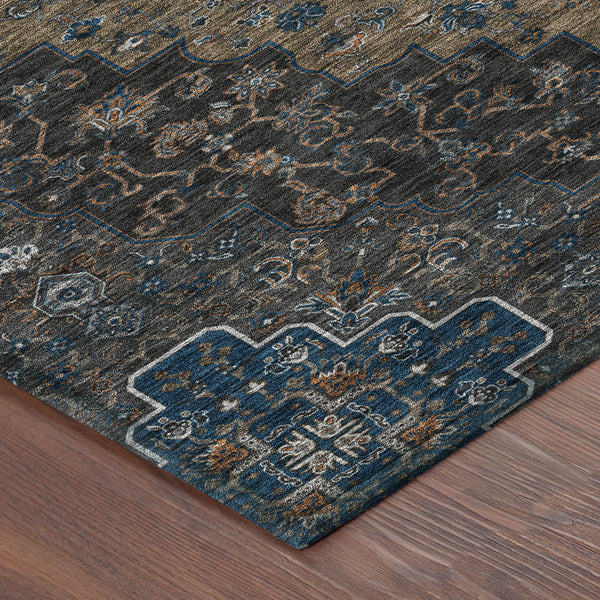 Medallion area rug in dark blue, black, and tan with ornate pattern and border