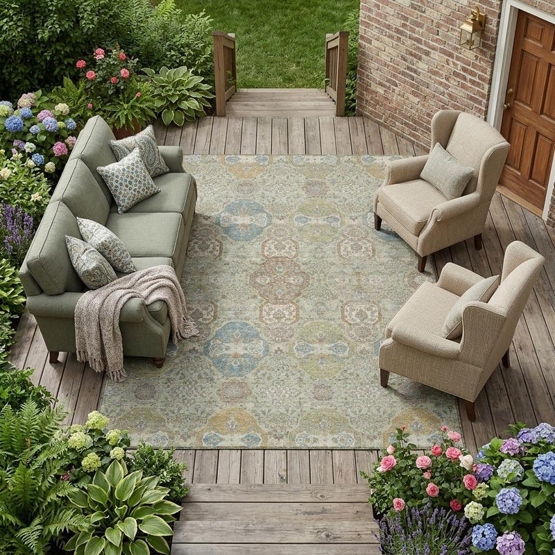 Sage and green floral area rug with distressed medallion pattern