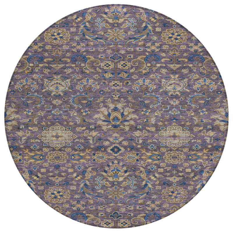 Round area rug with blue, purple, and gold floral medallion pattern