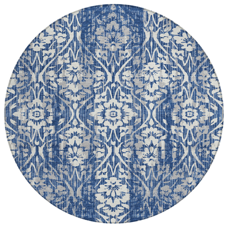 Round blue and white damask area rug, flat woven surface
