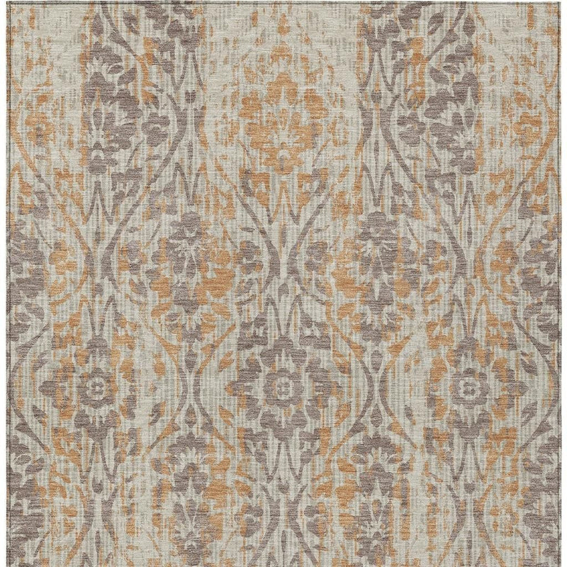 Beige and copper damask area rug with vertical ornate pattern and muted gray accents