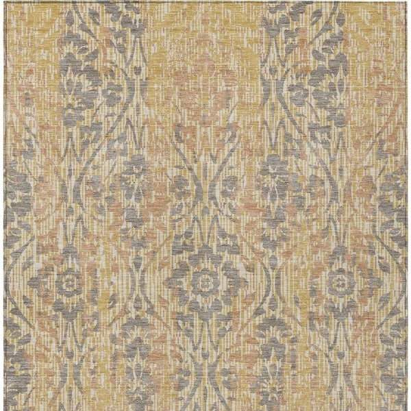 Gold, tan, and dark gray damask area rug with textured floral medallion pattern