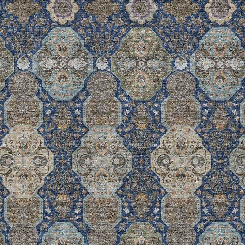Navy and gray floral medallion area rug close-up with repeating geometric shapes