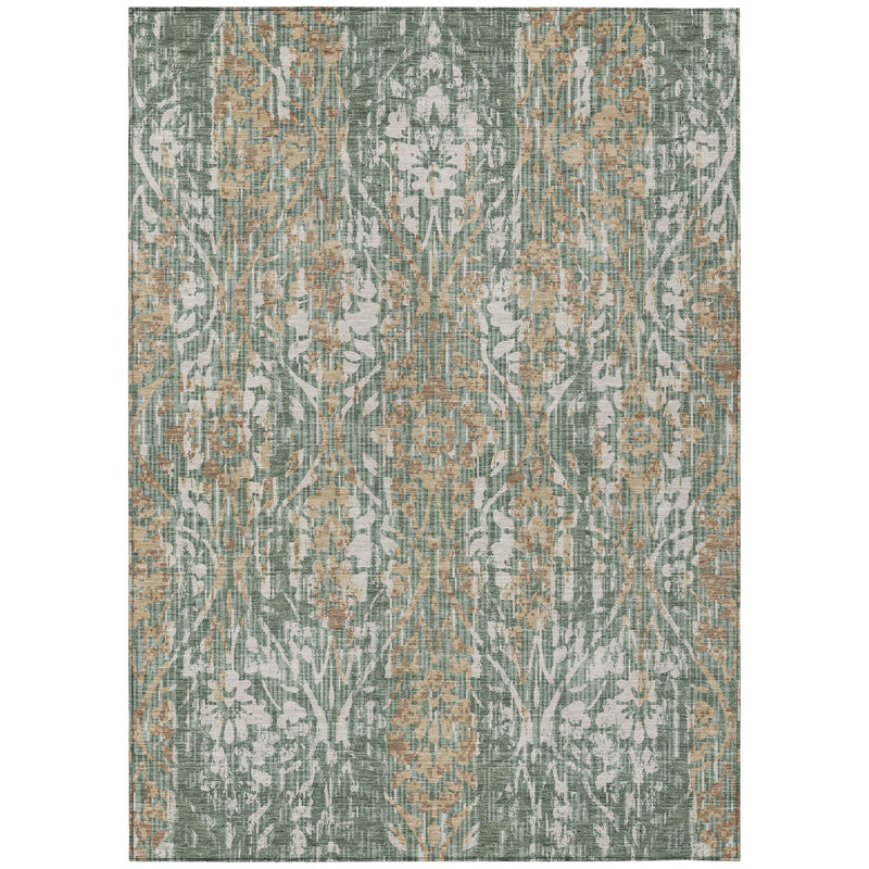 Green and sage damask area rug with ornate distressed motif on a light background.