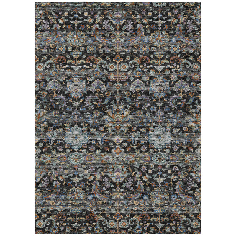Charcoal area rug with repeating multicolor floral and geometric pattern