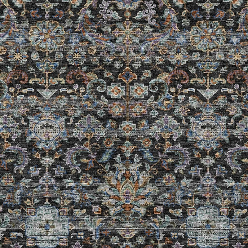Close-up of charcoal area rug texture with multicolor ornamental pattern
