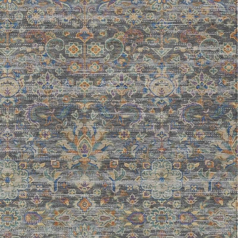 Gray and silver floral medallion area rug with multicolor ornamental pattern, close-up.