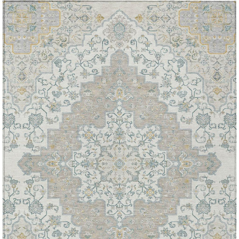 Light ivory and taupe area rug with central medallion and blue ornamental motifs