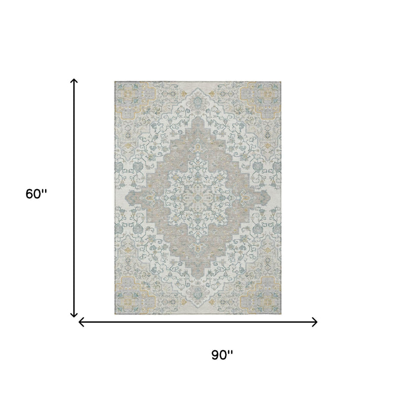 Rectangular medallion area rug, 60 in by 90 in, in ivory, taupe, and blue