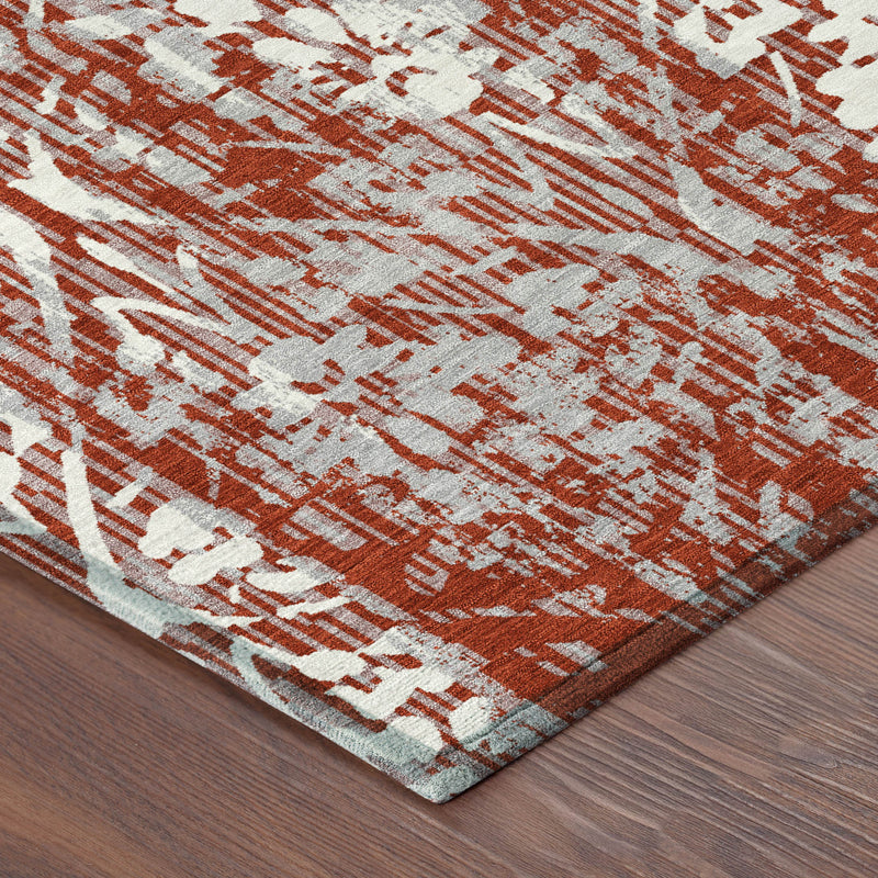 Corner view of rust-red and cream round damask area rug with flat woven texture
