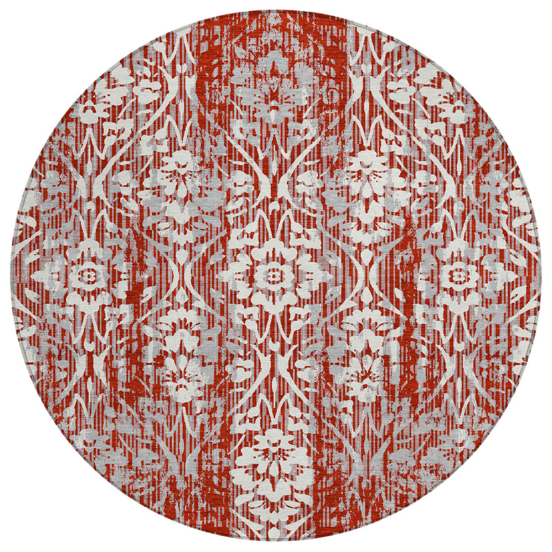 Red and cream round damask area rug with repeating medallion motifs