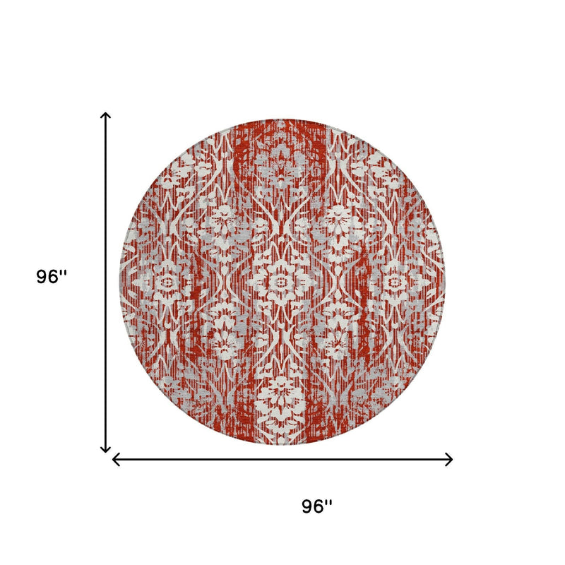 96-inch round damask area rug, rust-red and cream with repeating medallions