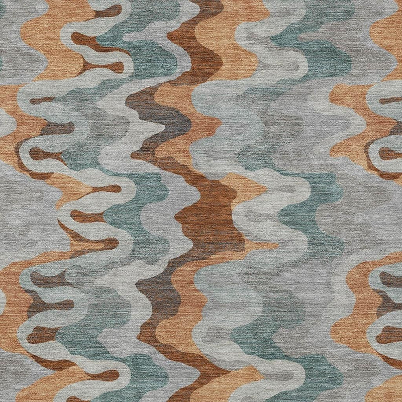 Tight view of abstract area rug texture with gray pile and wavy pattern in teal and rust
