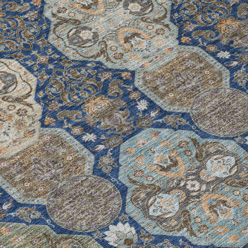 Navy and gray floral area rug with textured medallion motifs and scrollwork