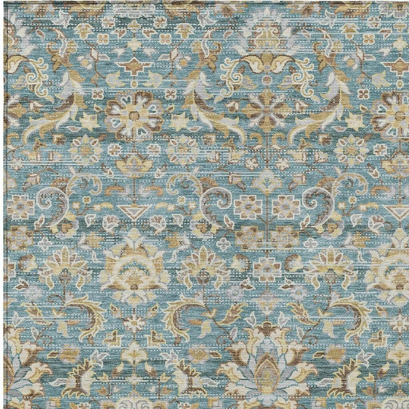 Teal blue rug with ornate beige-and-tan scrolling medallion and damask pattern