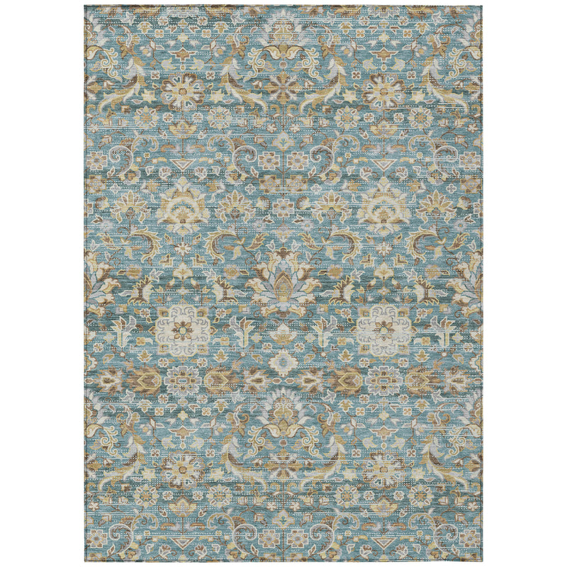 Rectangular teal blue area rug with beige and tan medallion floral motif