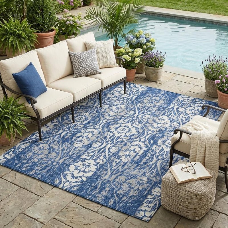 Blue damask area rug on outdoor patio with seating